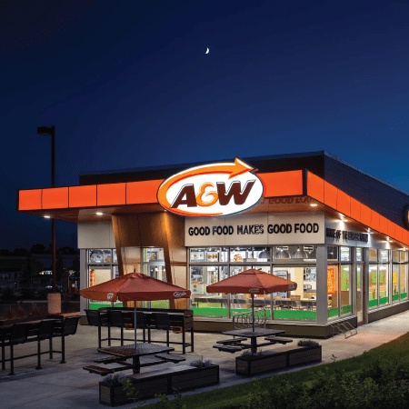 An A&W restaurant storefront at night