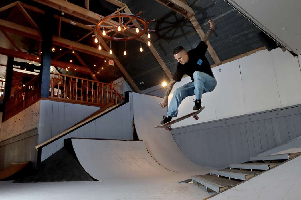 Skateboarding inside the Belong Centre